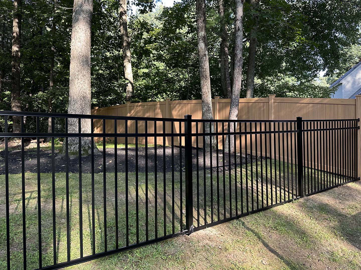 Black aluminum 3 rail residential fence  in Chelmsford  MA